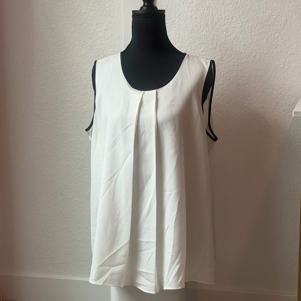 Calvin Klein cream and black trimmed nylon shirt. Size large